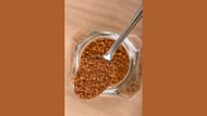 Instant coffee is made by dehydrating concentrated liquid coffee (Image via Canva)