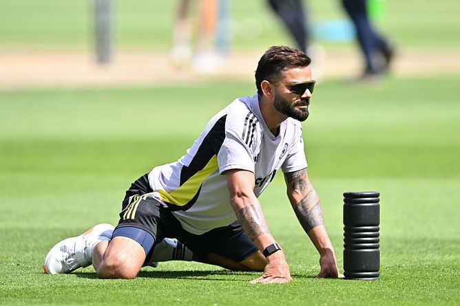 Virat Kohli plays football while drinking tea from a cup during practice session in 2025 Champions Trophy [Watch]