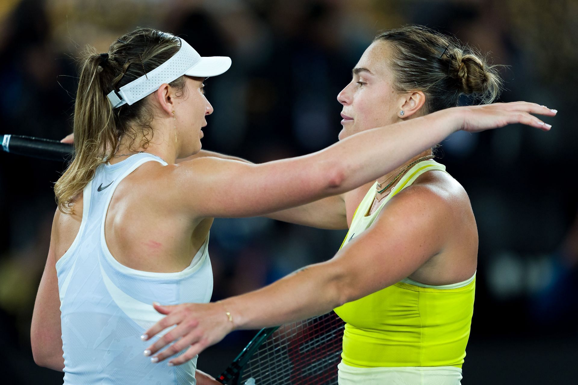 Paula Badosa (L) and Aryna Sabalenka (R) hugging after the semifinal of 2025 Australian Open - Source: Getty