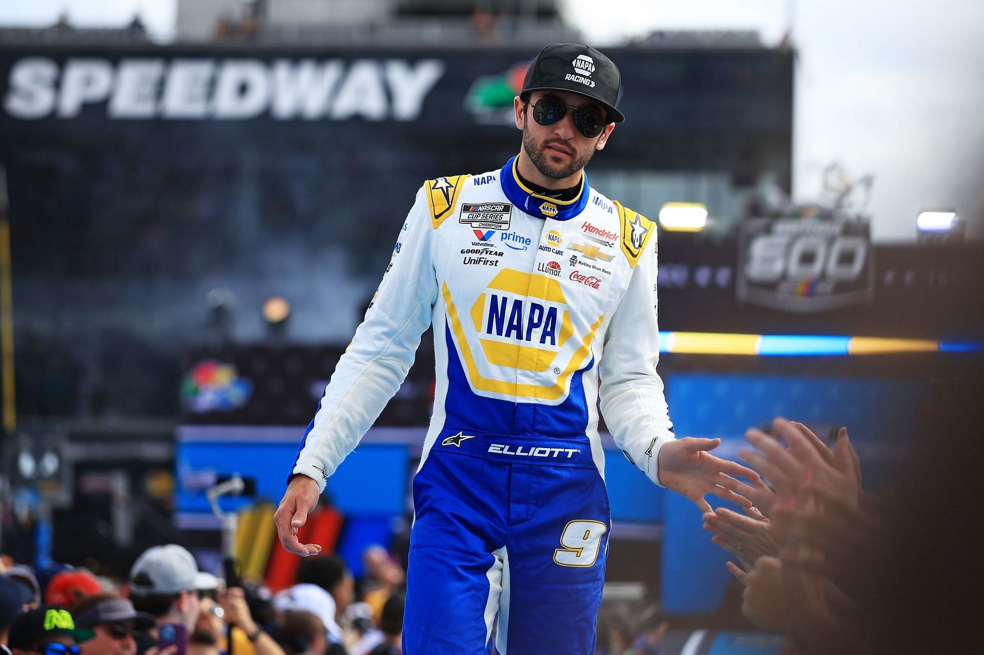 DAYTONA BEACH, FLORIDA - FEBRUARY 16: Chase Elliott, driver of the #9 NAPA Auto Parts Chevrolet greets fans as he walks onstage during driver intros prior to the NASCAR Cup Series Daytona 500 at Daytona International Speedway on February 16, 2025 in Daytona Beach, Florida. (Photo by Mike Ehrmann/Getty Images) - Source: Getty