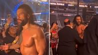 [WATCH] Roman Reigns in disbelief after Seth Rollins attack; Paul Heyman had to escort him backstage