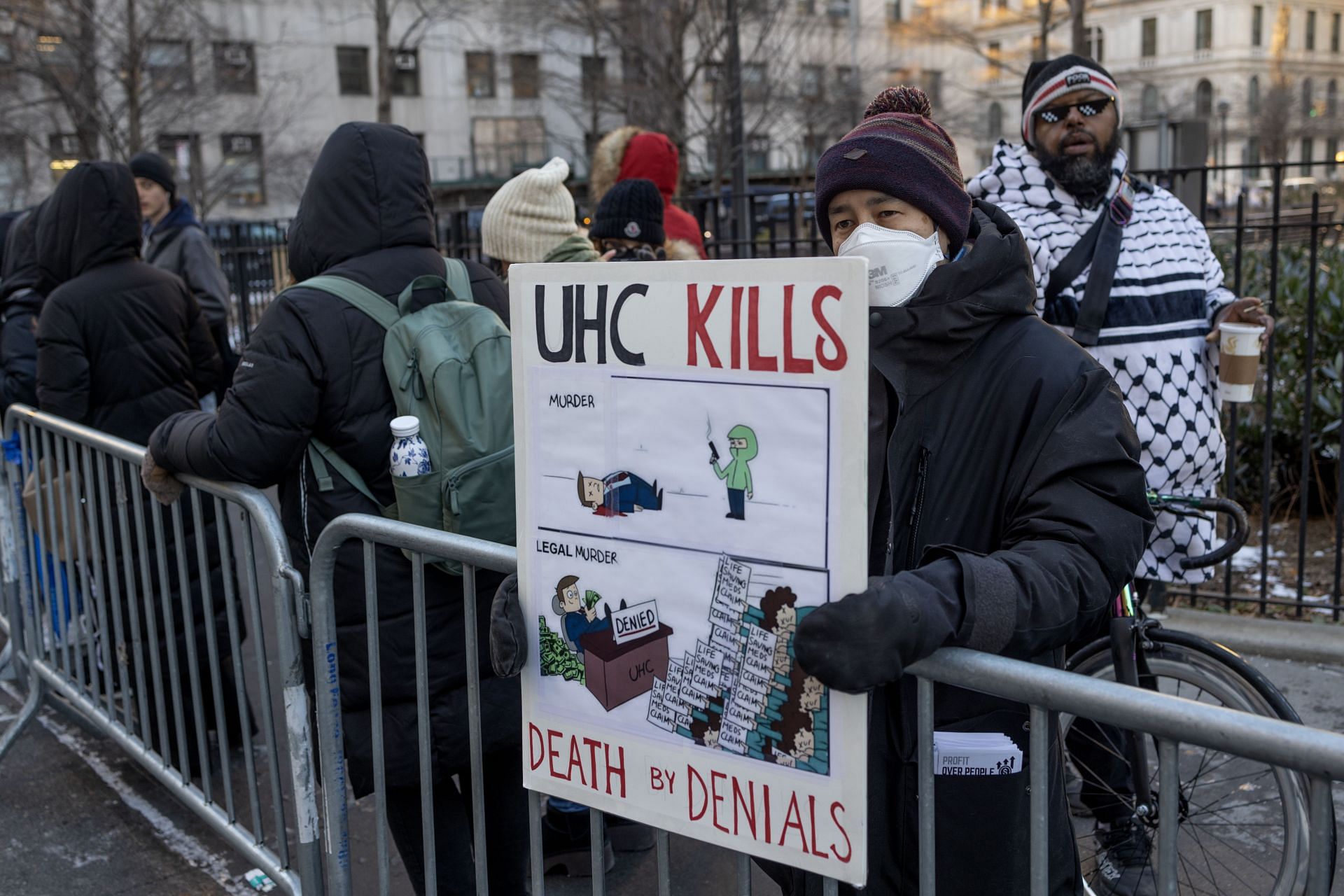 Supporters of Luigi Mangione Stand Outside Court During His Arraingment (Image via Getty)