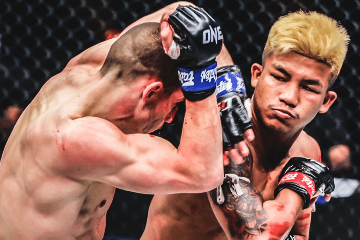 Rodtang (right) hammers Jacob Smith with a big blow [Photo via ONE Championship]