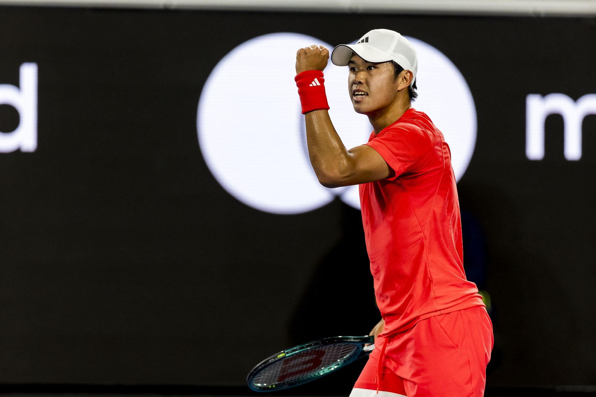 Learner Tien celebrates after winning a point against Daniil Medvedev at the Australian Open 2025 - Source: Getty