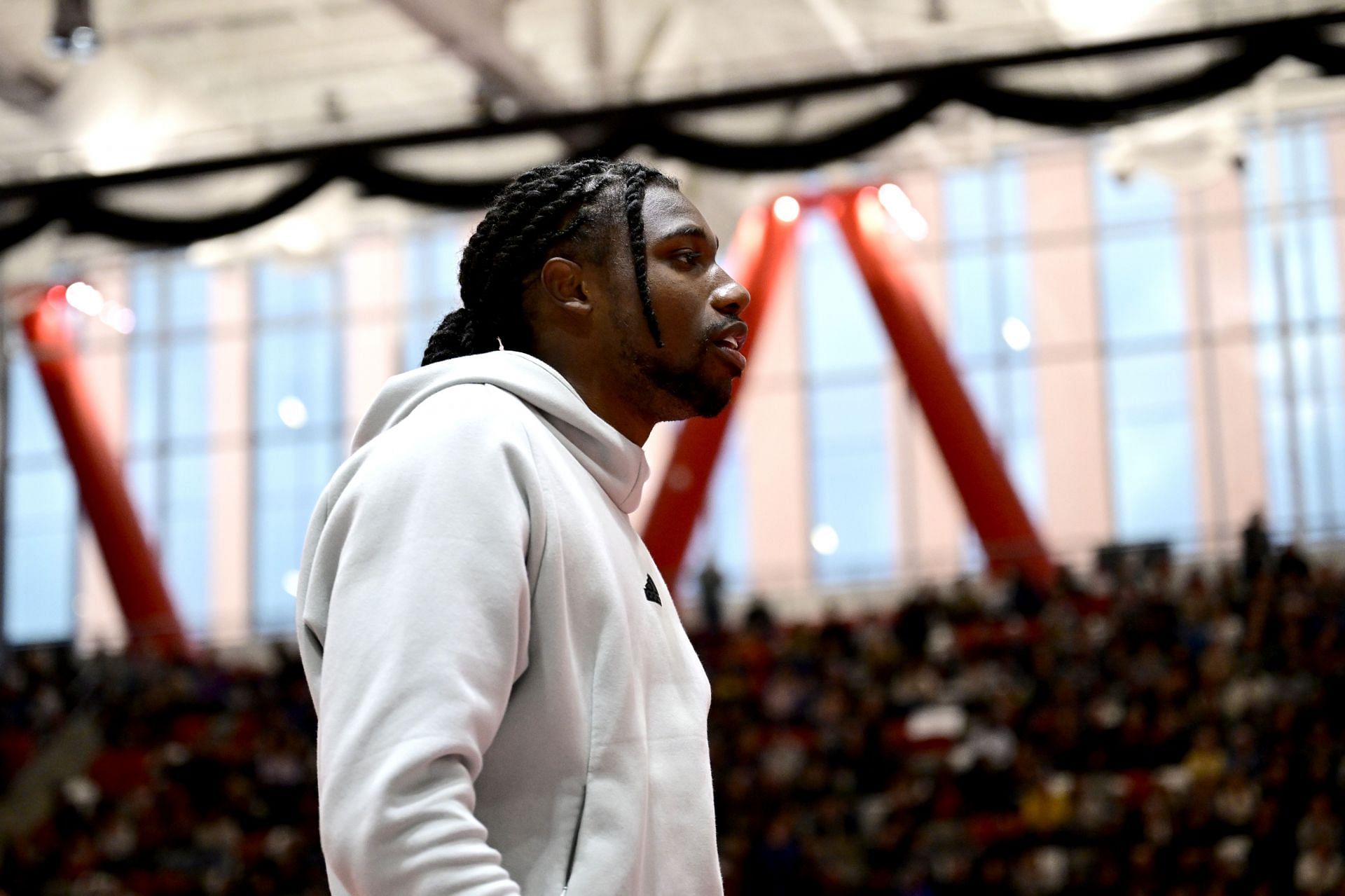 Noah Lyles in a white hoody during the warmup sessions of the 2025 New Balance Indoor Grand Prix (Image via: Getty Images)