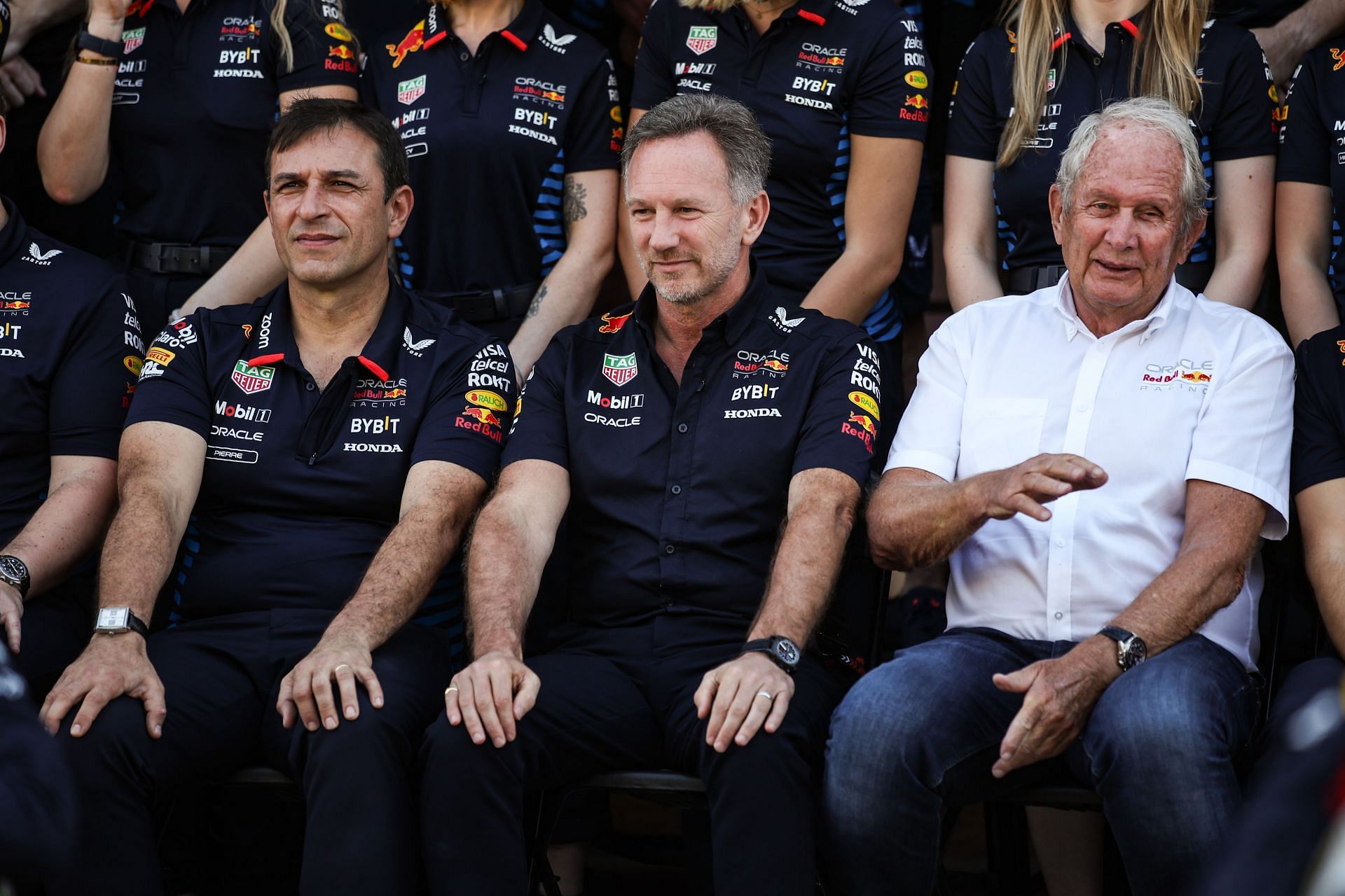 (L-R) Pierre Wache, Christian Horner, and Helmut Marko pose for a portrait during the Abu Dhabi Grand Prix - Source: Getty