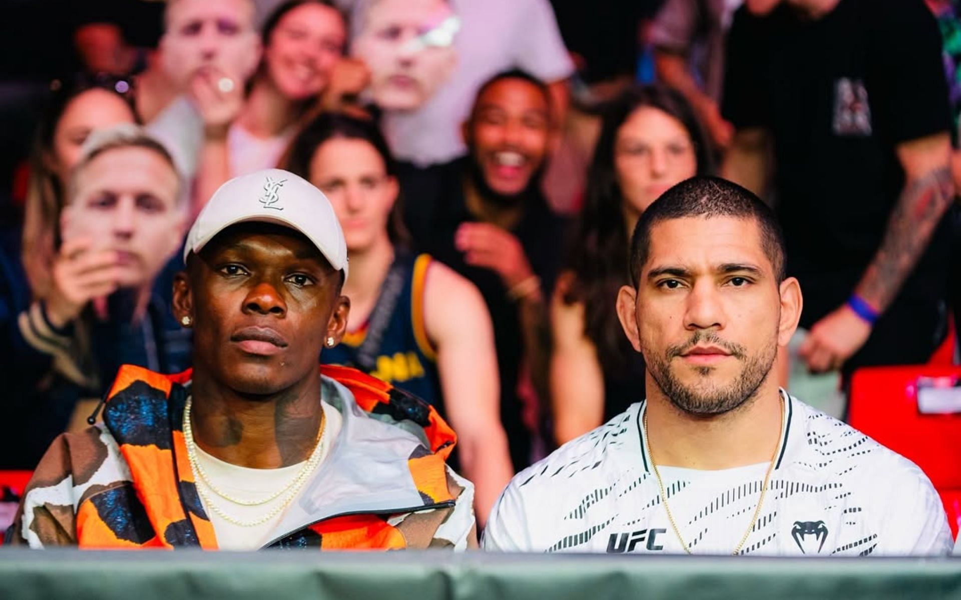 Alex Pereira (right) invites Israel Adesanya (left) to train with him while attending UFC 312 together. [Image courtesy: @stylebender on Instagram]