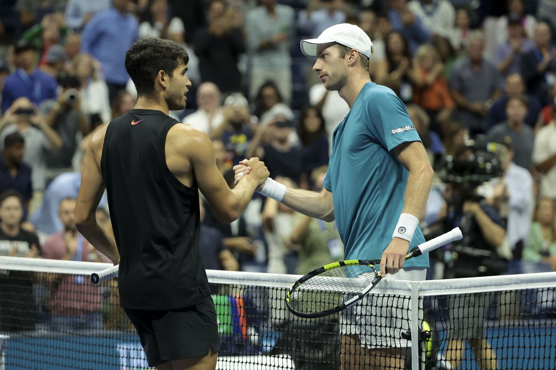 Alcaraz pictured with Botic van de Zandschulp at the 2024 US Open - Image Source: Getty