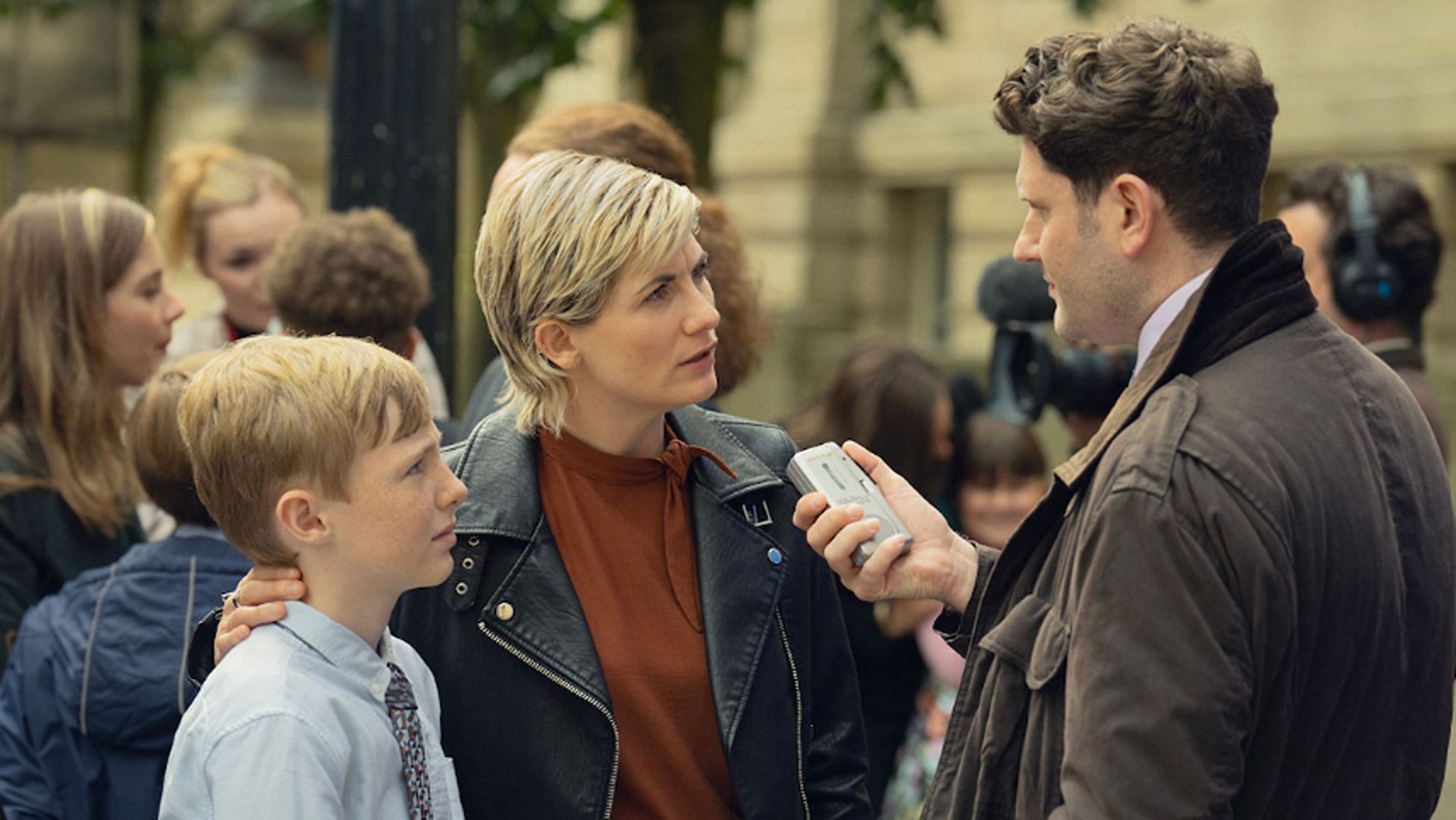 Toby Eden as Connor and Jodie Whittaker as Susan in Toxic Town (Image via Netflix)