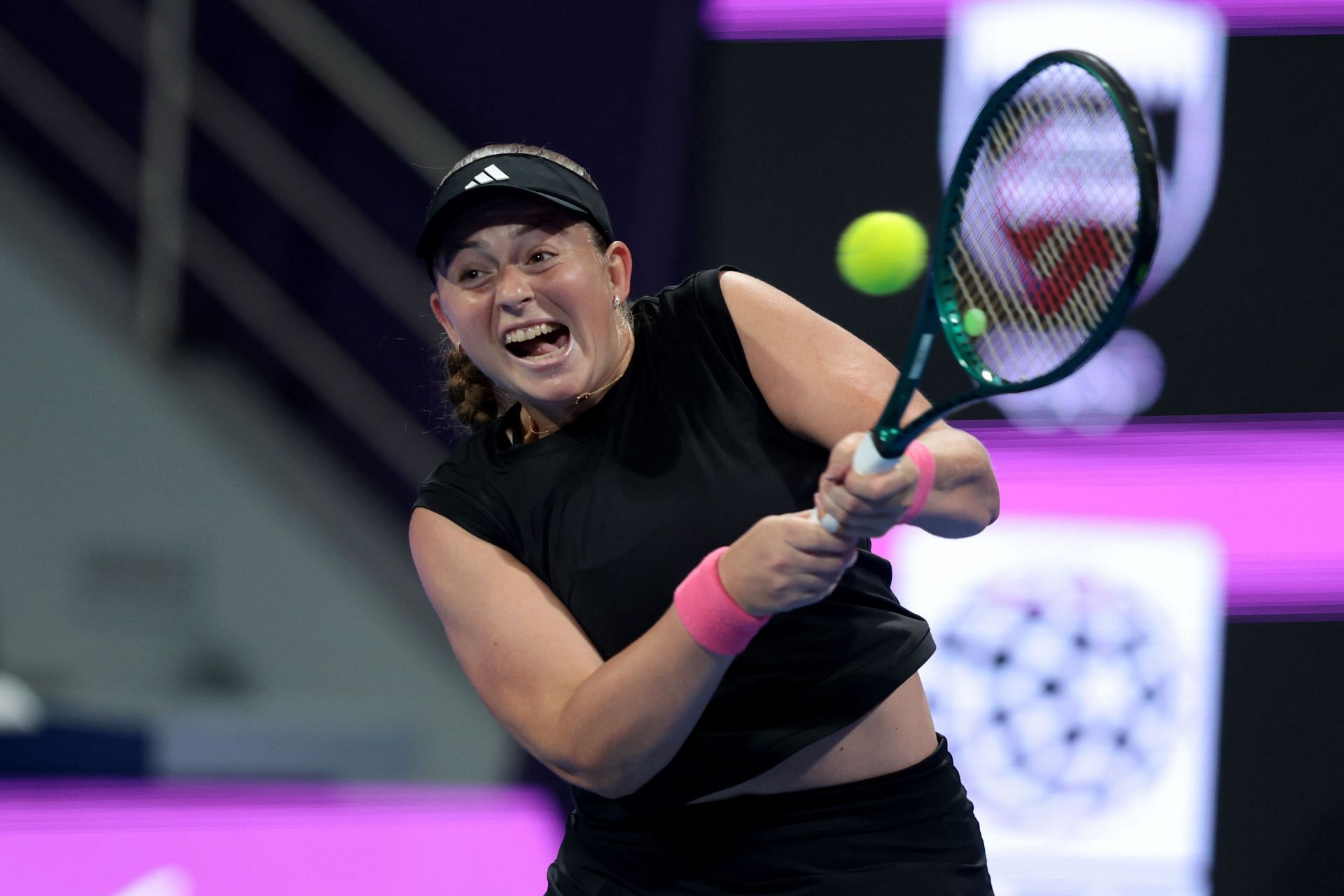 Jelena Ostapenko of Latvia competes against Iga Swiatek of Poland during the Qatar TotalEnergies Open - Source: Getty