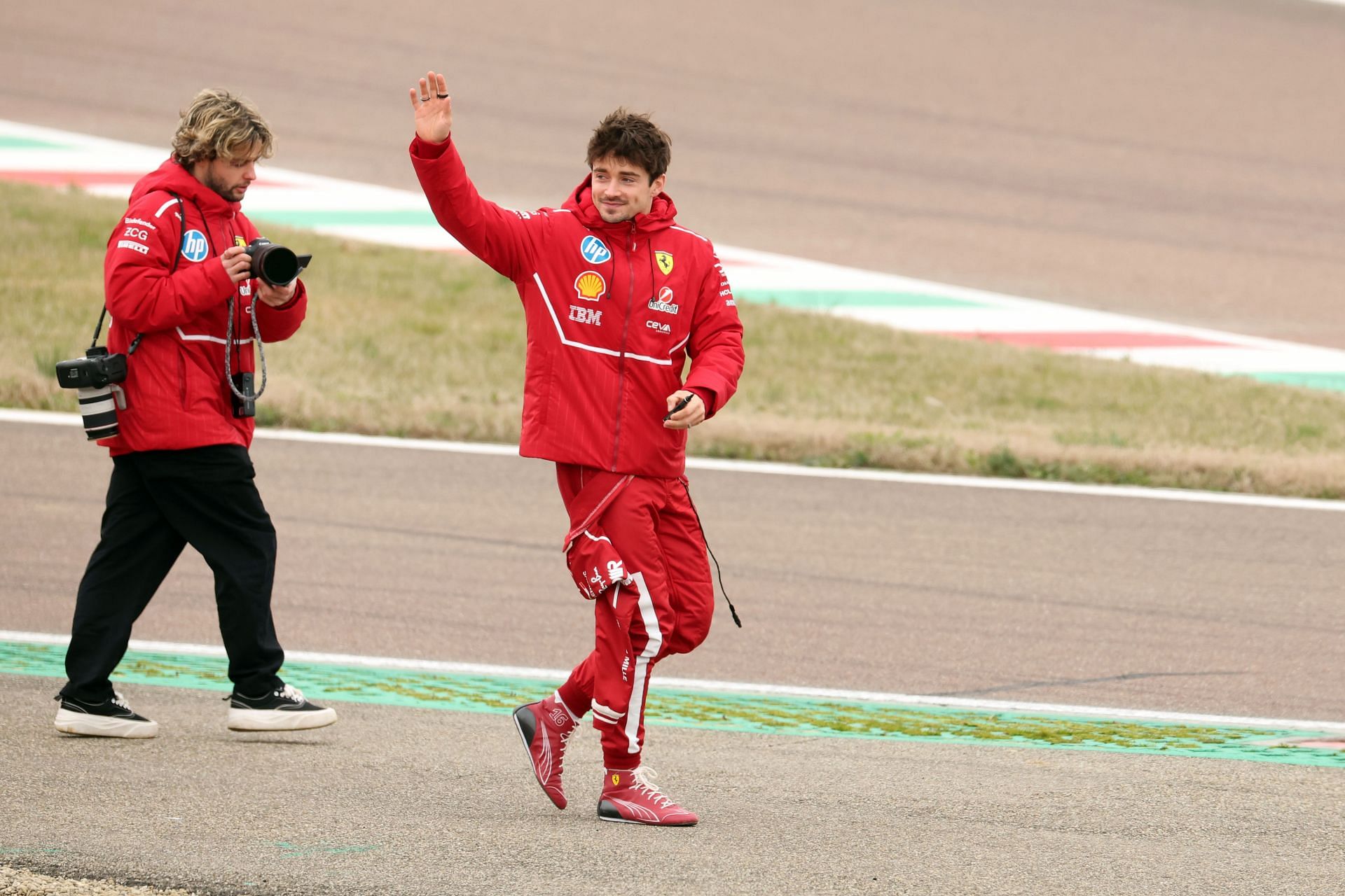 Charles Leclerc greets fans while testing for Ferrari (Image Source: Getty)