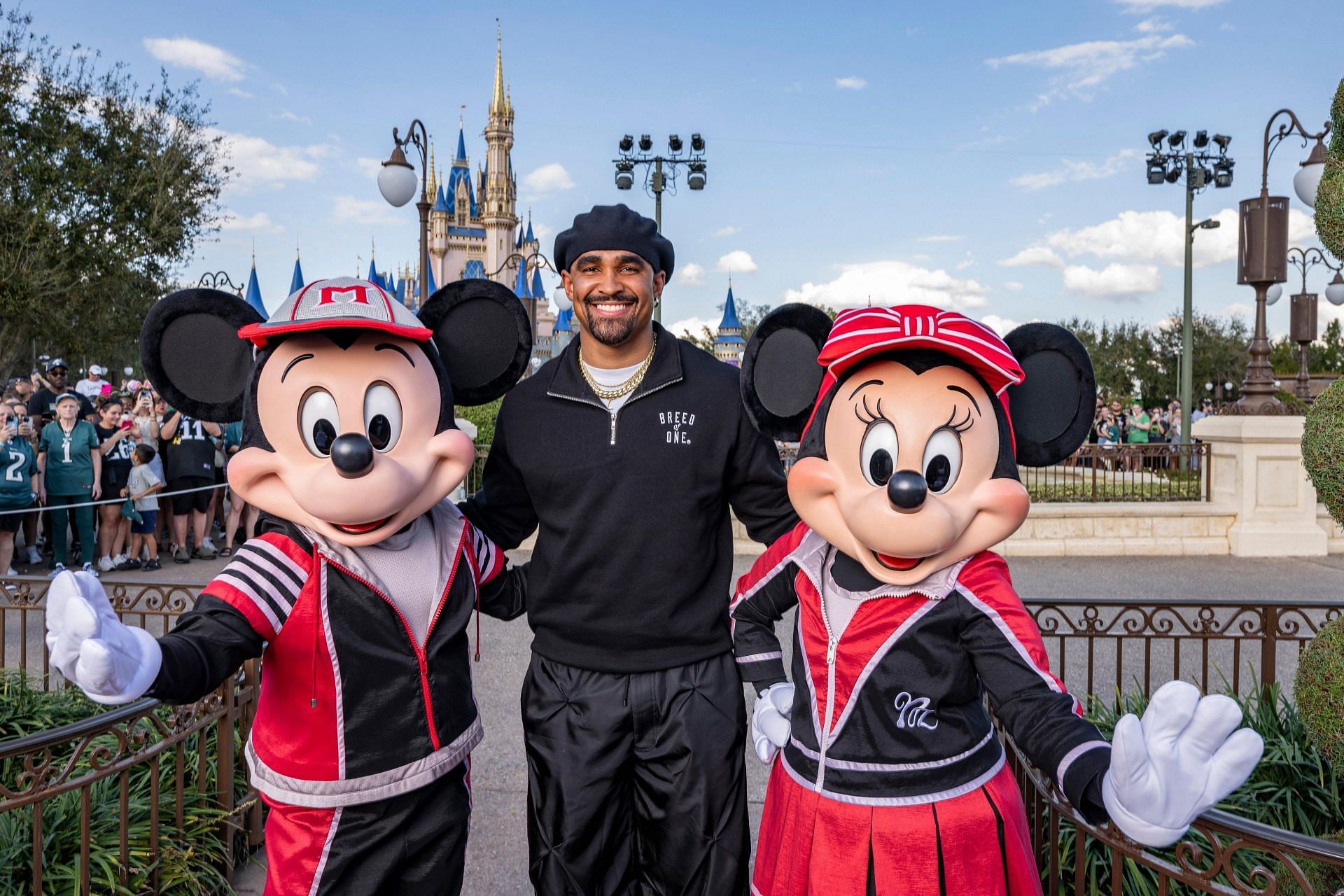 Hurts, Minnie, and Mickey pose for a picture