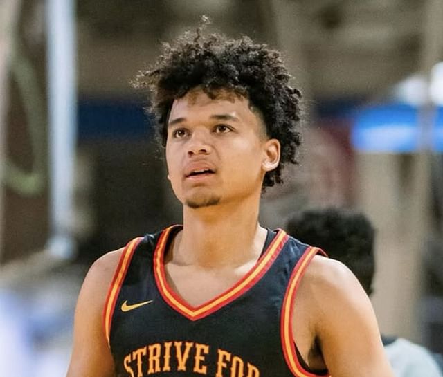 Elite prospect in action &ndash; a top-ranked high school basketball player competing for Strive For Greatness on the AAU circuit