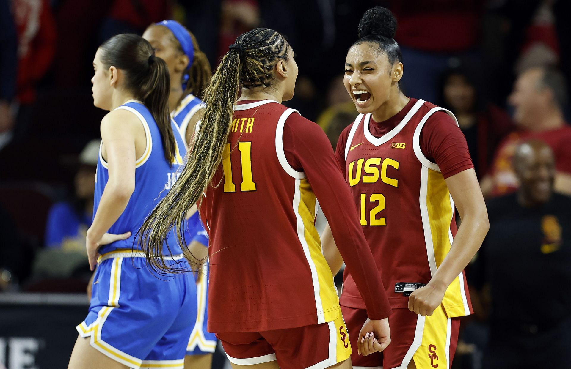 Kennedy Smith (#11) and JuJu Watkins (#12) of the USC Trojans react against the UCLA Bruins in the second half at Galen Center on February 13, 2025 in Los Angeles, California. Photo: Getty