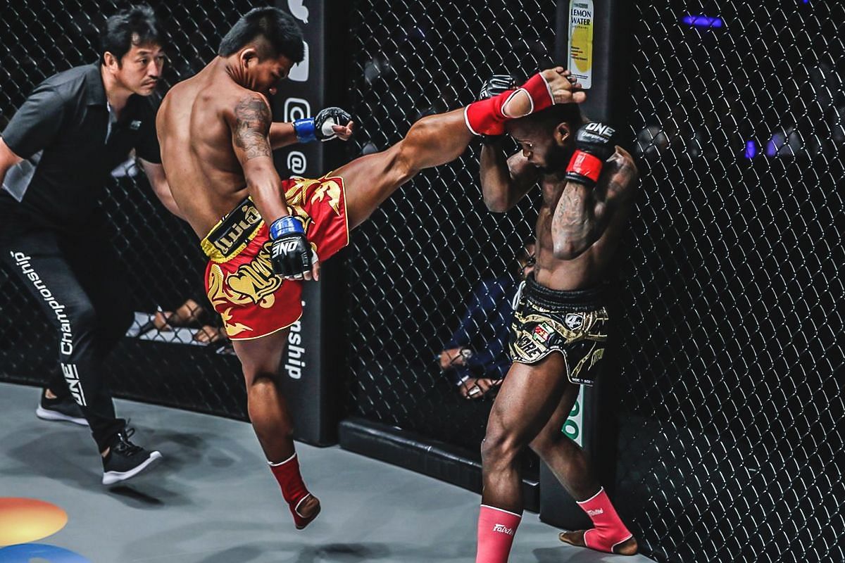 Rodtang throws a head kicking versus Sergio Wielzen in September 2018. [Photo via: ONE Championship]