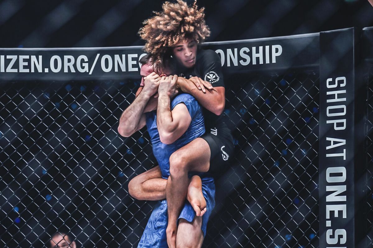 Kade Ruotolo submitted Uali Kurzhev to become the inaugural ONE lightweight submission grappling world champion. [Photo via: ONE Championship]