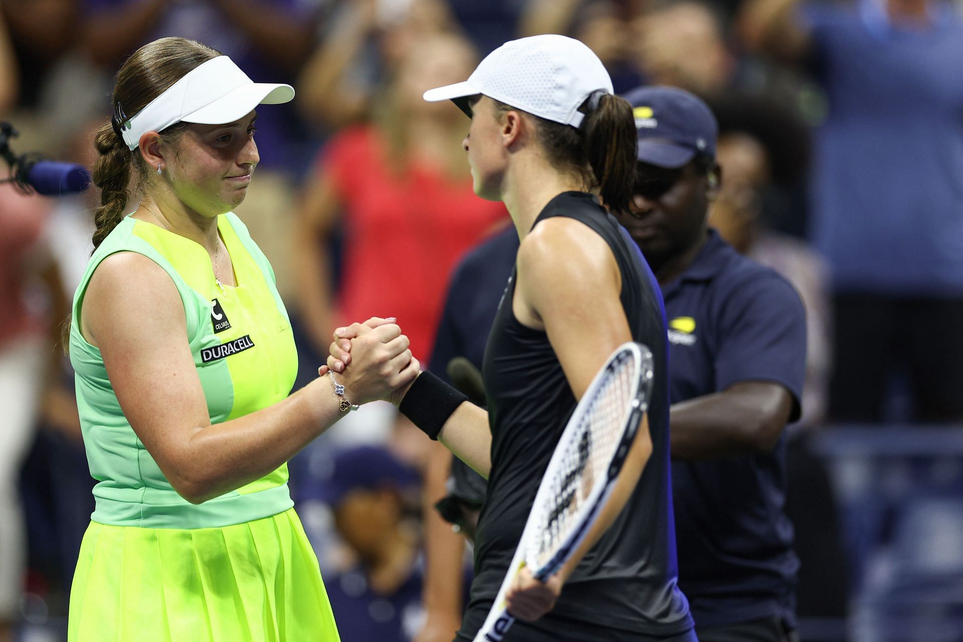 Jelena Ostapenko greets Iga Swiatek after beating her at US Open 2023 (Source: Getty)