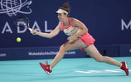 Noskova plays a forehand in the Mubadala Abu Dhabi Open - Source: Getty