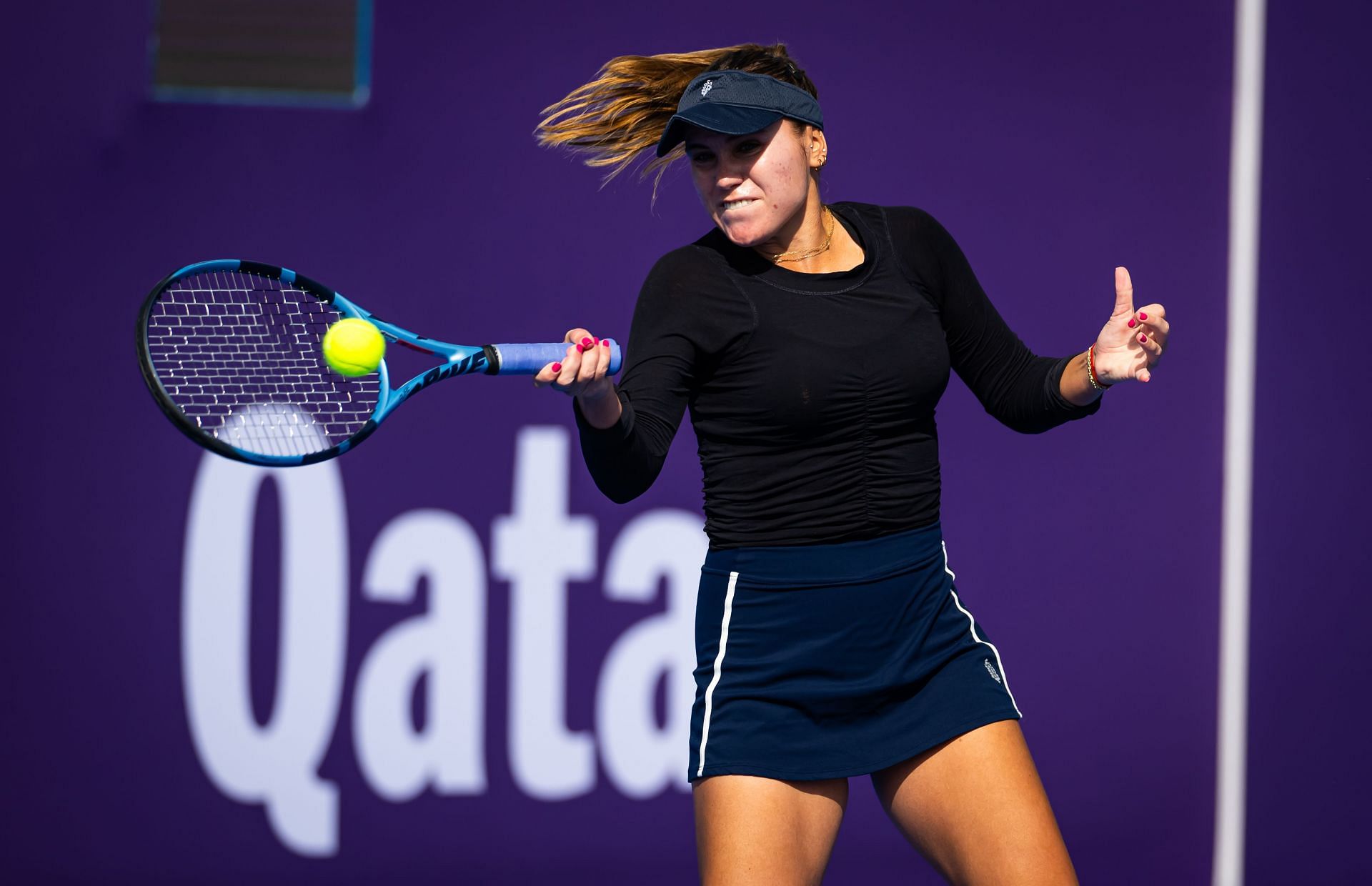 Sofia Kenin in action against Ashlyn Krueger during the first round of the Qatar TotalEnergies Open - Source: Getty