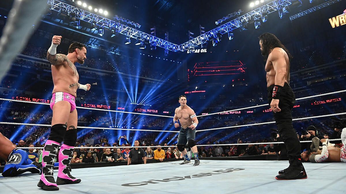 CM Punk, John Cena, and Roman Reigns at this year's Royal Rumble (Image credits: wwe.com)