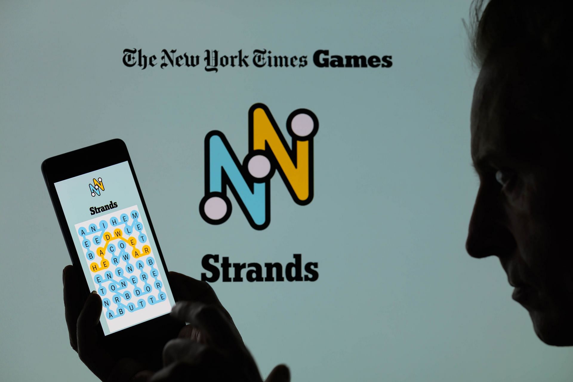 NYT Strands Game - Photo Illustration - Source: Getty