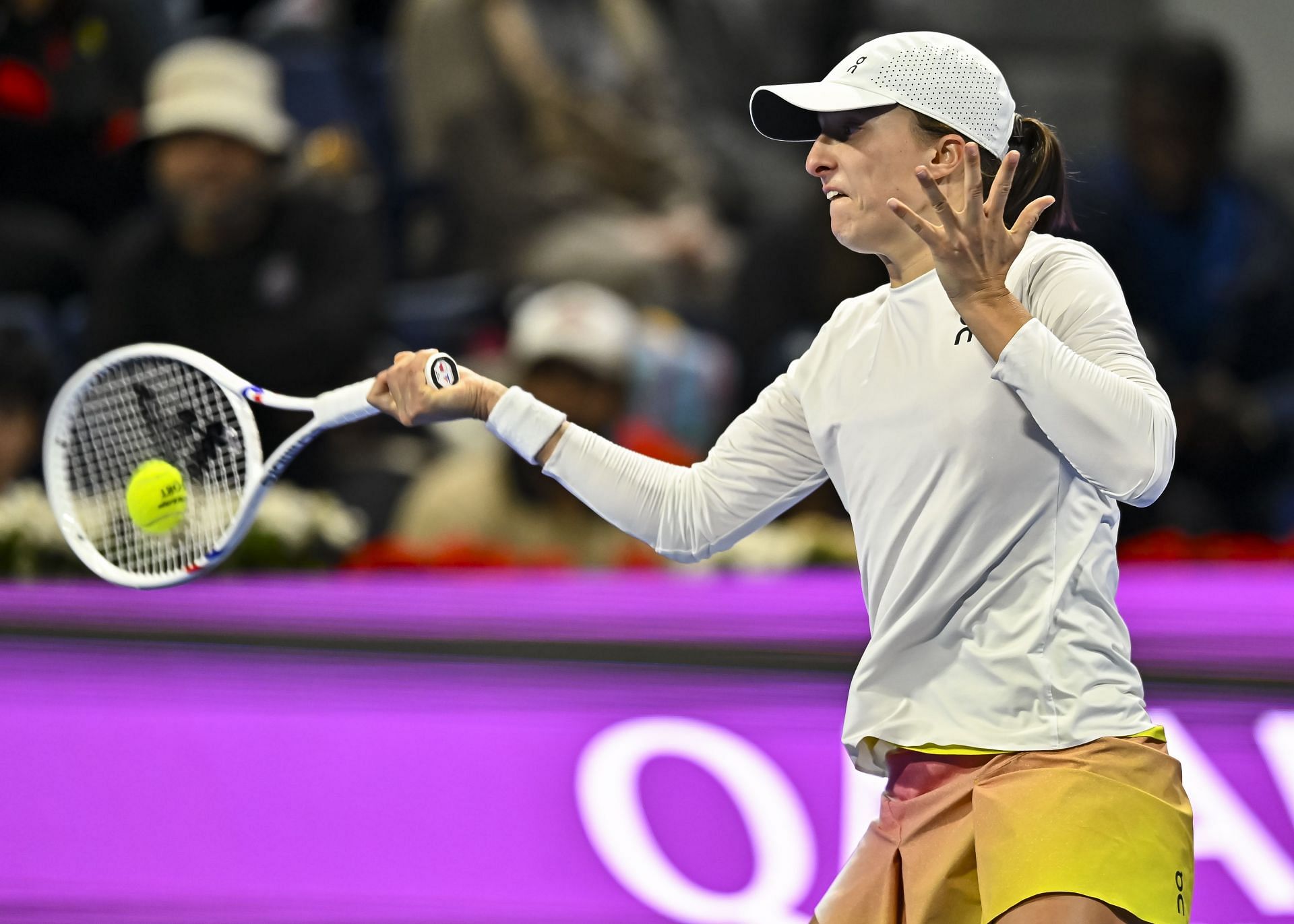 Iga Swiatek of Poland competes in her semi-final match against Jelena Ostapenko of Latvia during the WTA Qatar TotalEnergies Open 2025 - Source: Getty