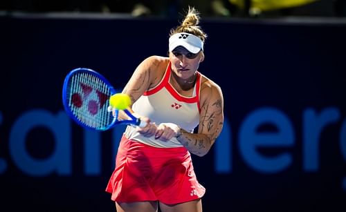 Marketa Vondrousova of the Czech Republic in action against Elina Svitolina of Ukraine in the first round on Day Two of the Qatar TotalEnergies Open - Source: Getty