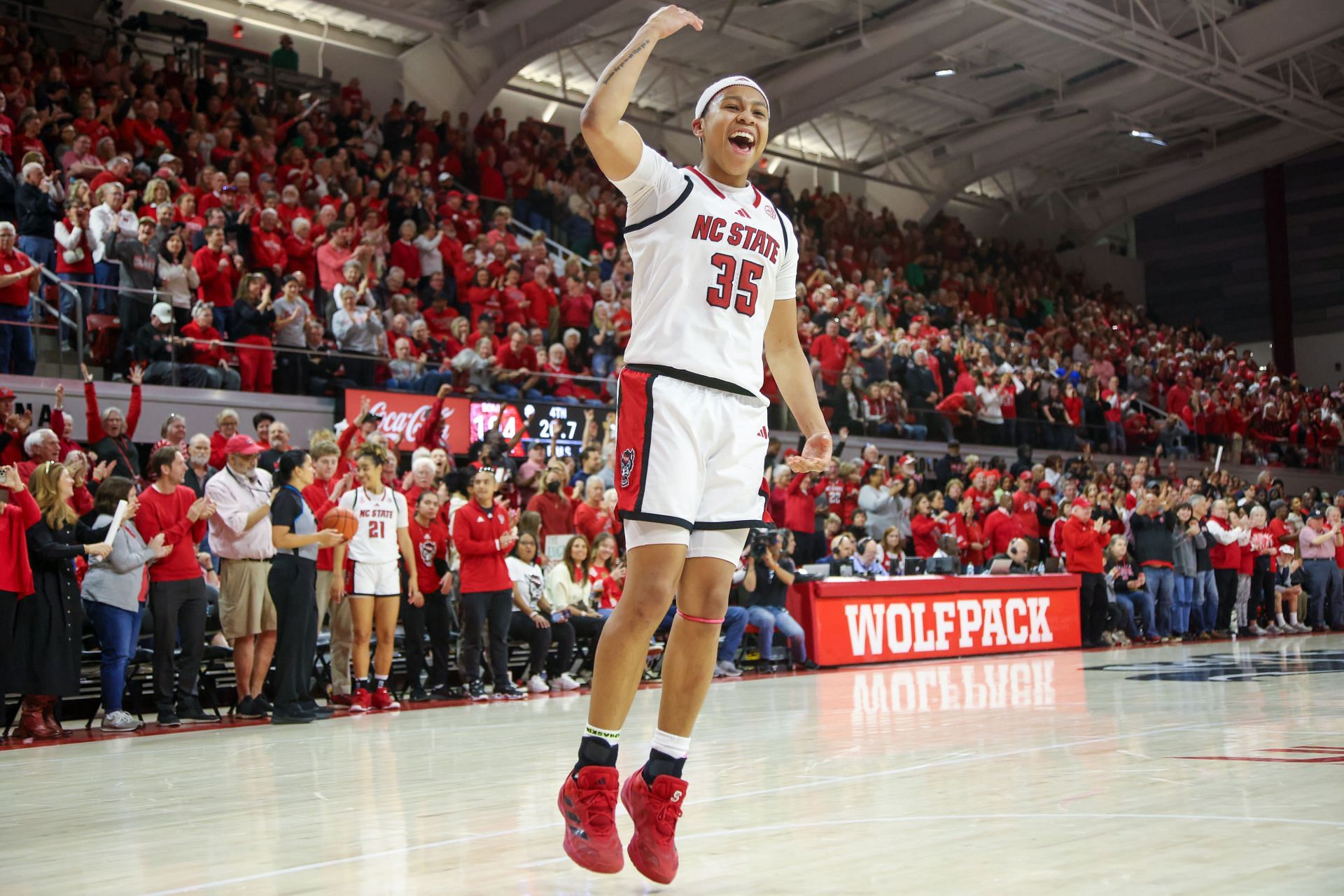 NC State Wolfpack guard Zoe Brooks (35) pumps the crowd up in double-overtime during their game against the Notre Dame Fighting Irish on February 23, 2025, at Reynolds Coliseum. Photo: Getty