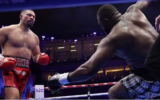 Video: Watch Anthony Joshua and Oleksandr Usyk's STUNNED ring-side reaction to Joseph Parker knocking out Martin Bakole while seated side-by-side