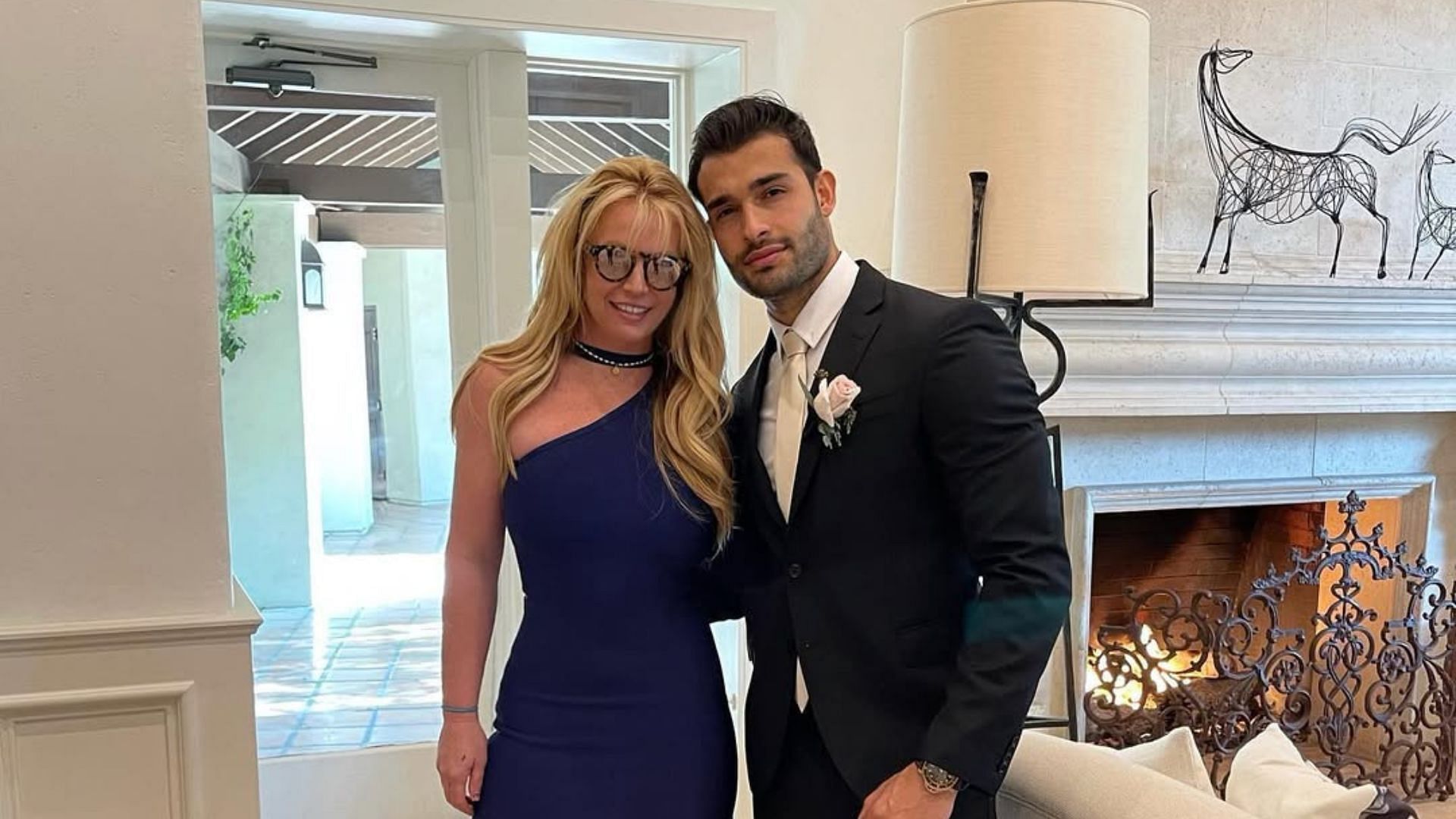 Sam Asghari with Britney Spears. [Image via Instagram/@samasghari]