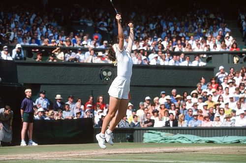 Martin Hingis celebrates after winning Wimbledon 1997 - Source: Getty