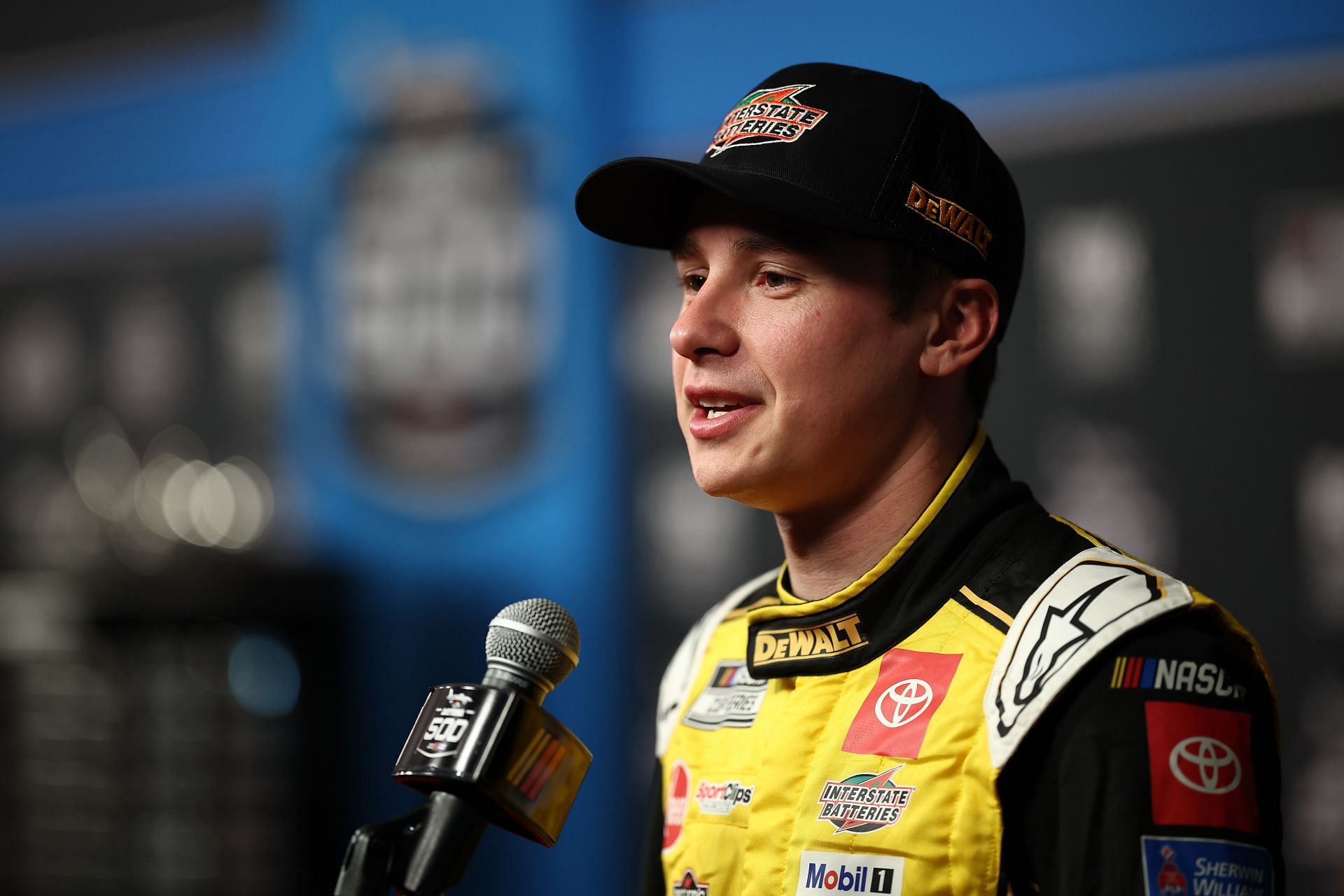 DAYTONA BEACH, FLORIDA - FEBRUARY 12: Christopher Bell, driver of the #20 DEWALT/Interstate Batteries Toyota speaks to the media during Media Day for the NASCAR Daytona 500 at Daytona International Speedway on February 12, 2025 in Daytona Beach, Florida. (Photo by Jared C. Tilton/Getty Images) - Source: Getty