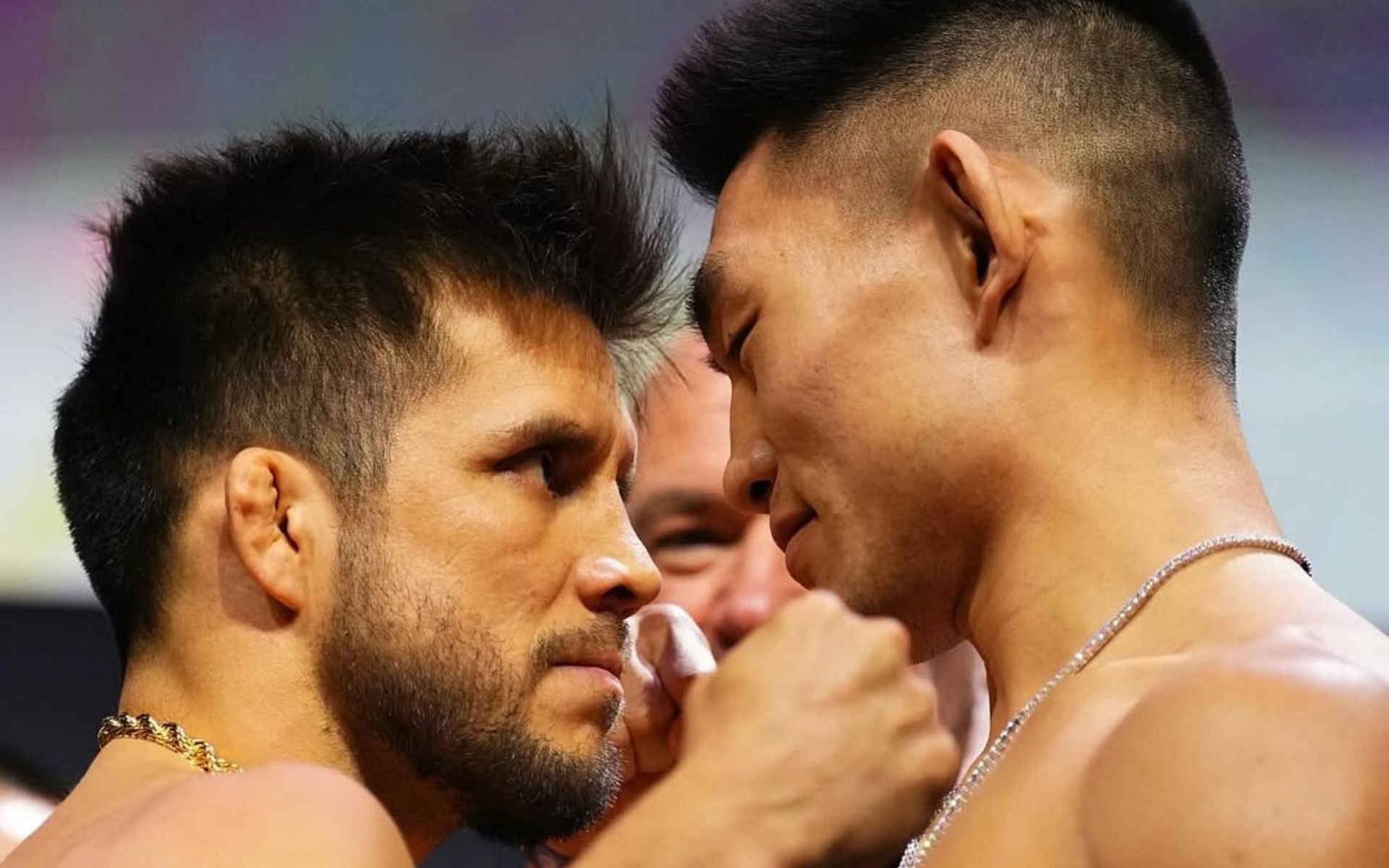 Henry Cejudo (left) wants to face Song Yadong (right) again. [Image courtesy: @ufc on Instagram]