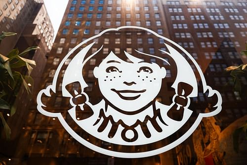 Wendy's logo on a restaurant's window in New York. (Image via Getty)