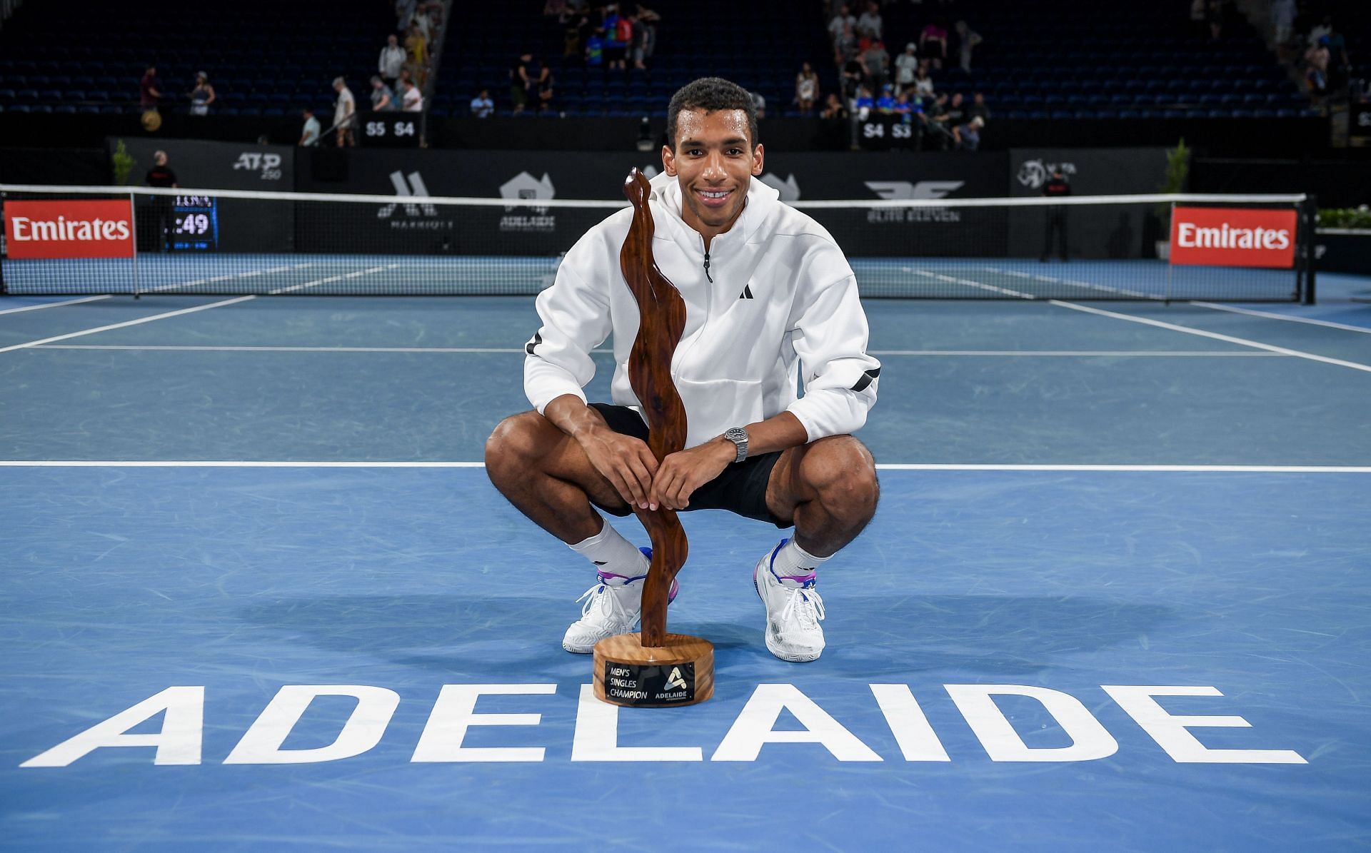 Felix Auger-Aliassime of Canada poses with the Mens Singles Champion Trophy during day six of the 2025 Adelaide International - Source: Getty