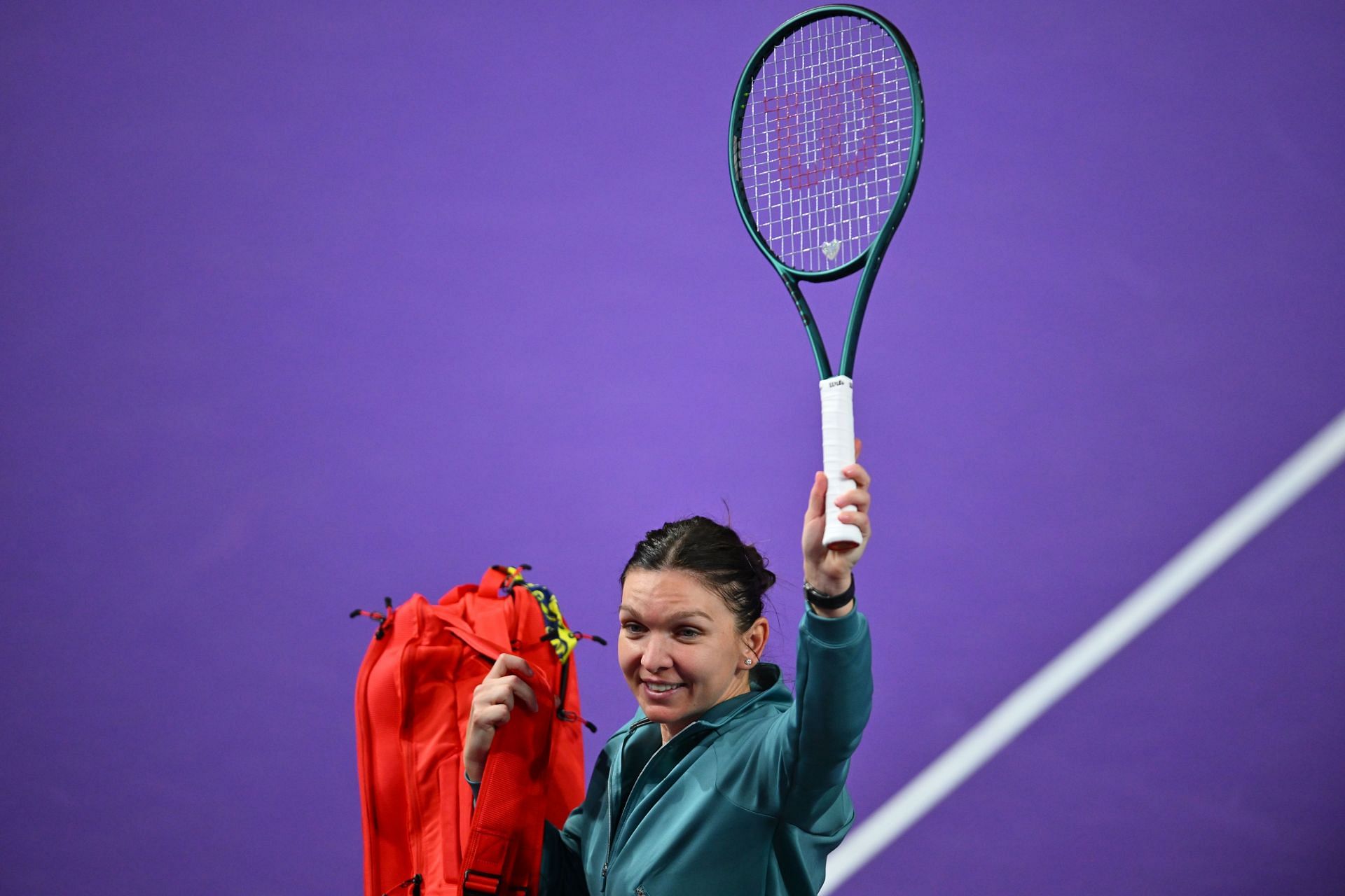 Simona Halep acknowledges the crowd after announcing her retirement on Wednesday. Source: Getty