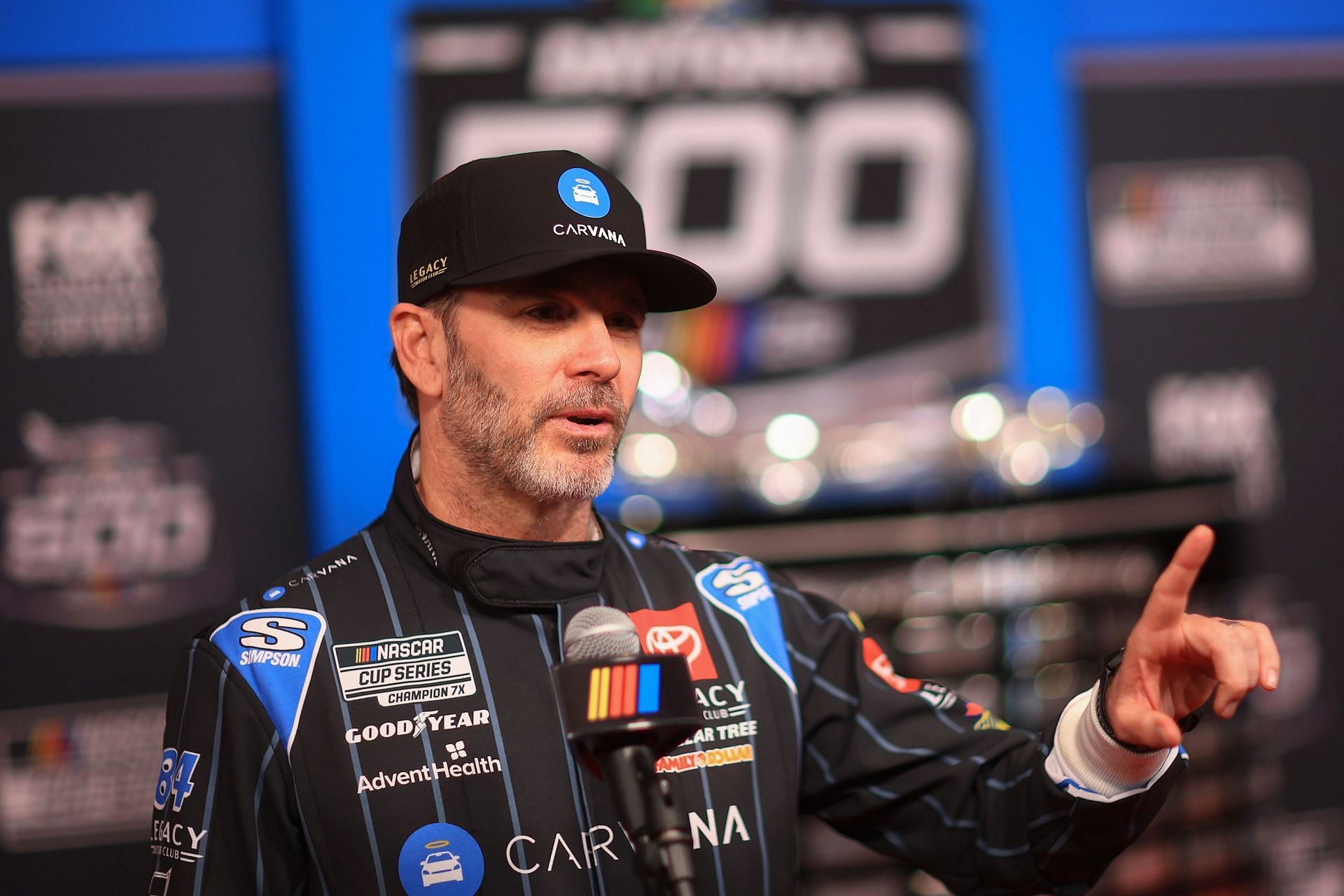 DAYTONA BEACH, FLORIDA - FEBRUARY 12: Jimmie Johnson, driver of the #84 Carvana Toyota speaks to the media during Media Day for the NASCAR Daytona 500 at Daytona International Speedway on February 12, 2025 in Daytona Beach, Florida. (Photo by Mike Ehrmann/Getty Images) - Source: Getty