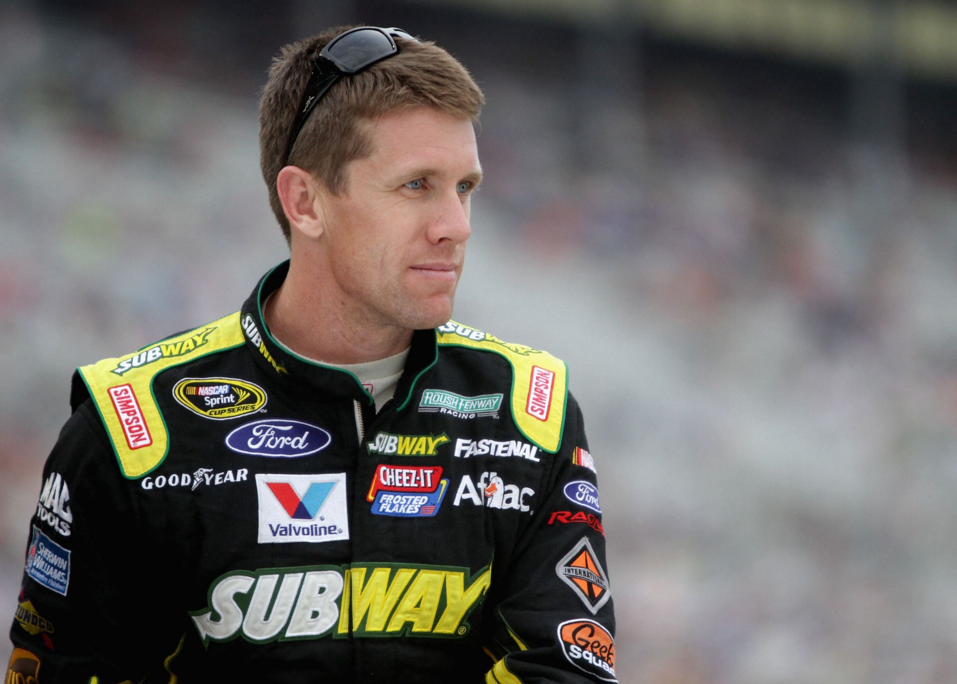 HAMPTON, GA - SEPTEMBER 01:  Carl Edwards, driver of the #99 Subway Ford, looks on during the NASCAR Sprint Cup Series AdvoCare 500 at Atlanta Motor Speedway on September 1, 2013 in Hampton, Georgia.  (Photo by Jerry Markland/Getty Images) - Source: Getty