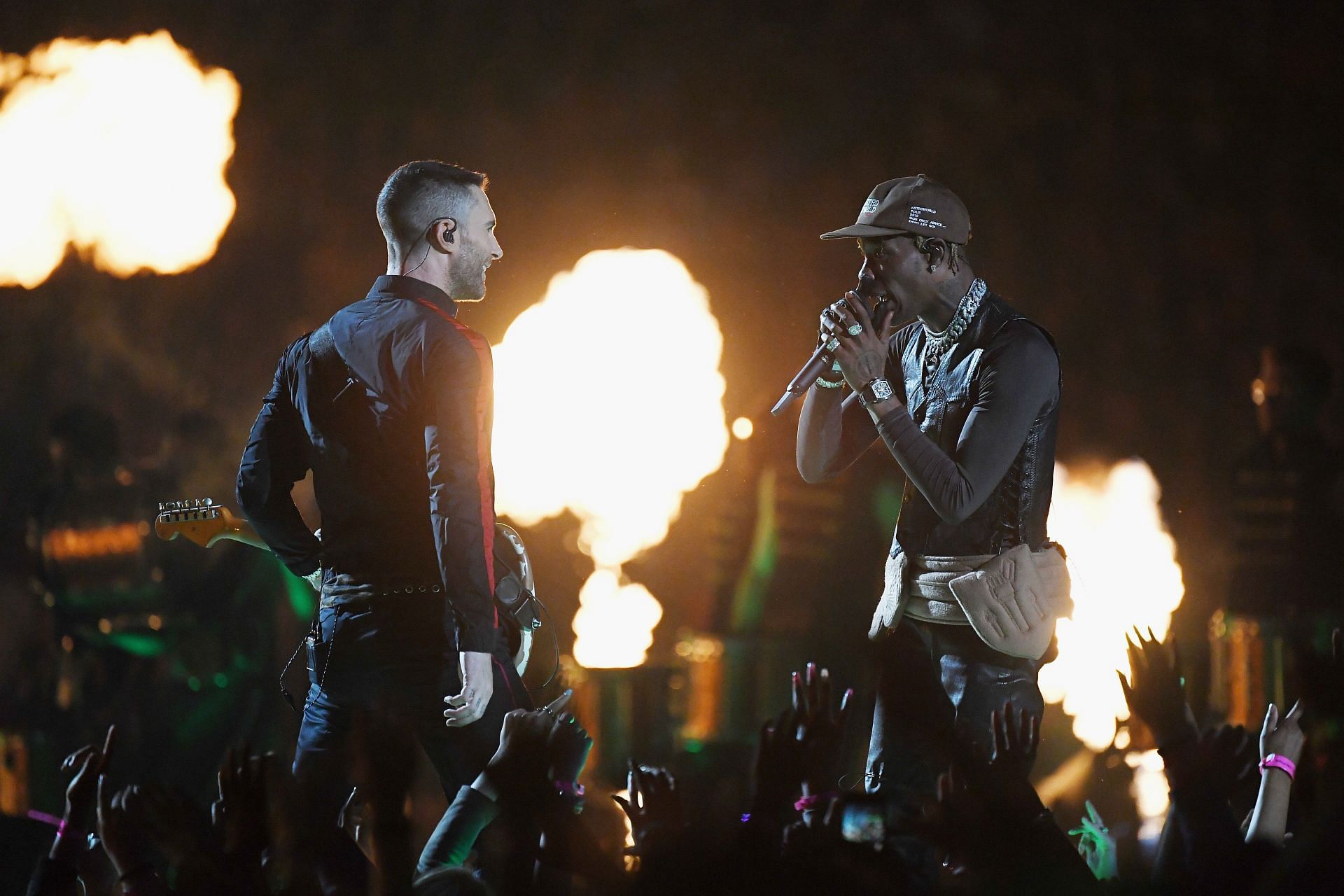 Travis Scott with Maroon 5&#039;s Adam Levine at the Super Bowl halftime show in 2019. Source: Getty