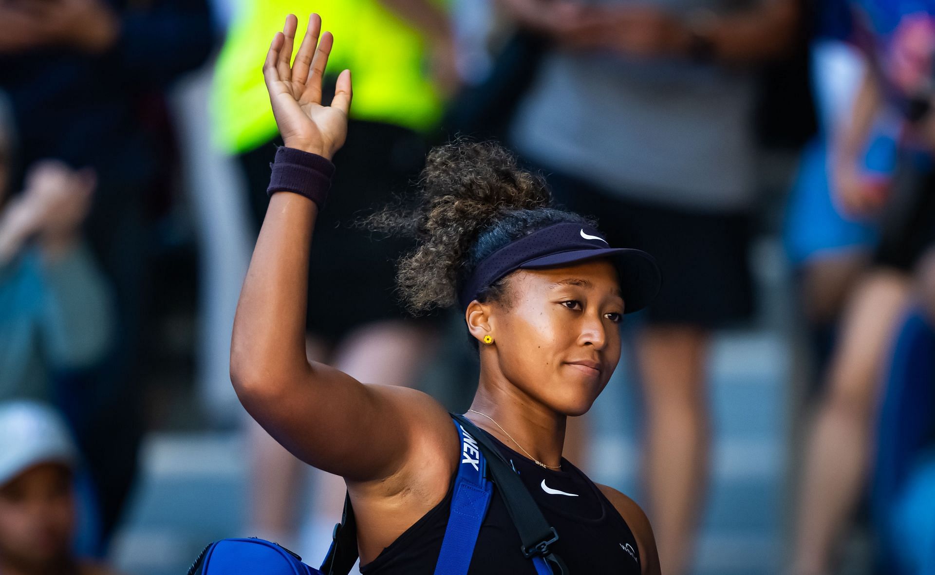 Naomi Osaka waves to the crowd at Australian Open 2025 (Source: Getty)