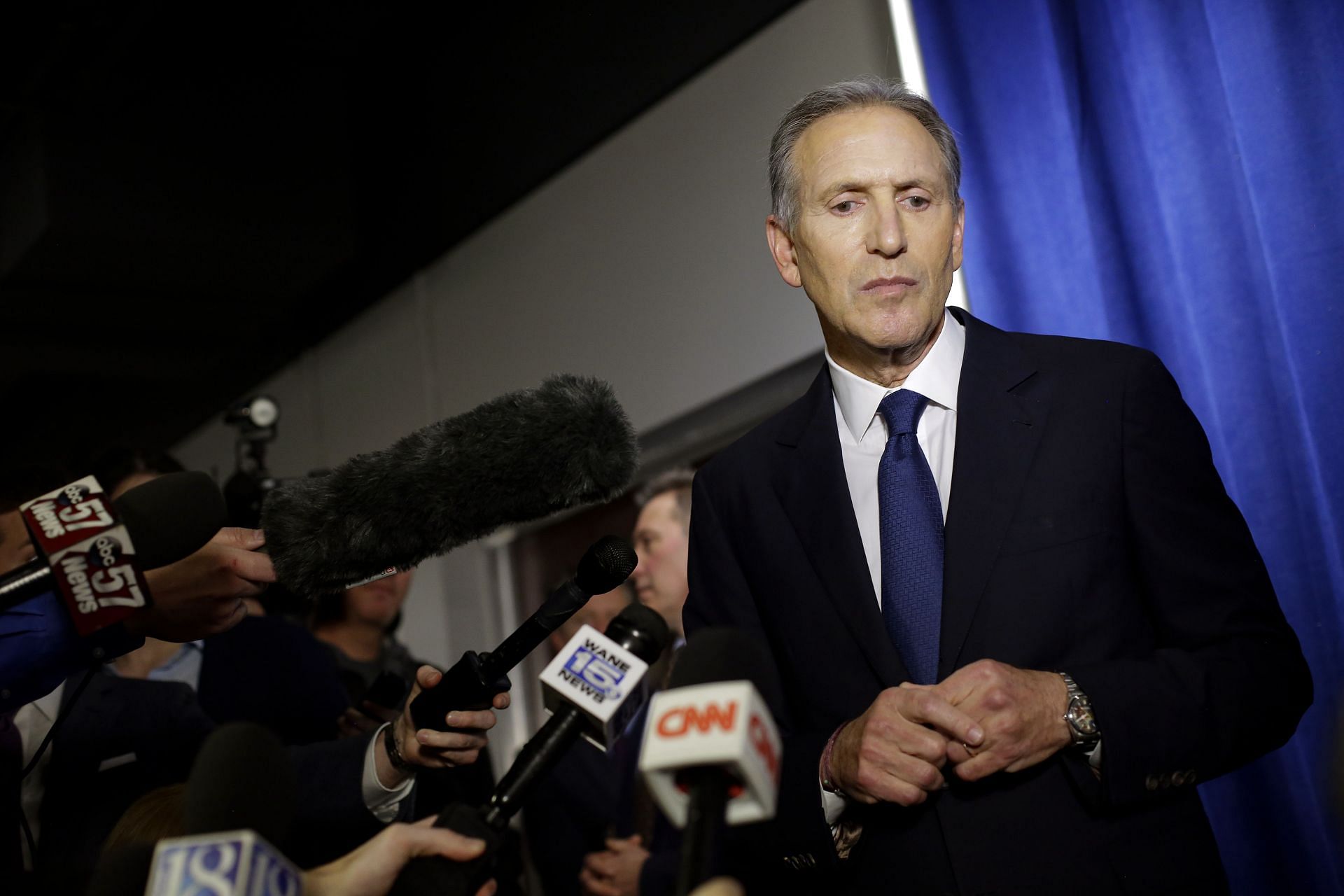 WEST LAFAYETTE, IN - FEBRUARY 07: Former Starbucks CEO Howard Schultz pauses as he talks to reporters at a news conference after speaking at Purdue University