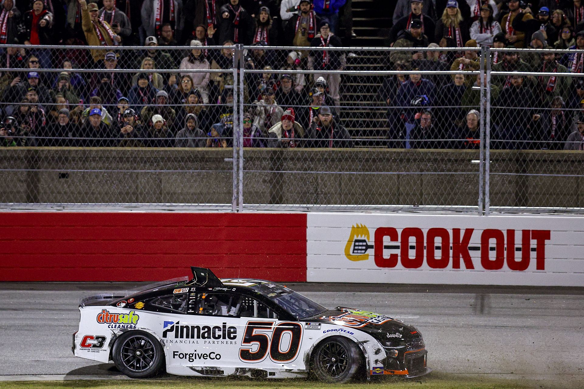 Burt Myers spins after an on-track incident with Ricky Stenhouse Jr. at the Cook Out Clash at Bowman Gray Stadium - Source: Getty Images