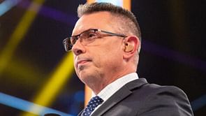 Michael Cole congratulates newly crowned champion during RAW after huge title change