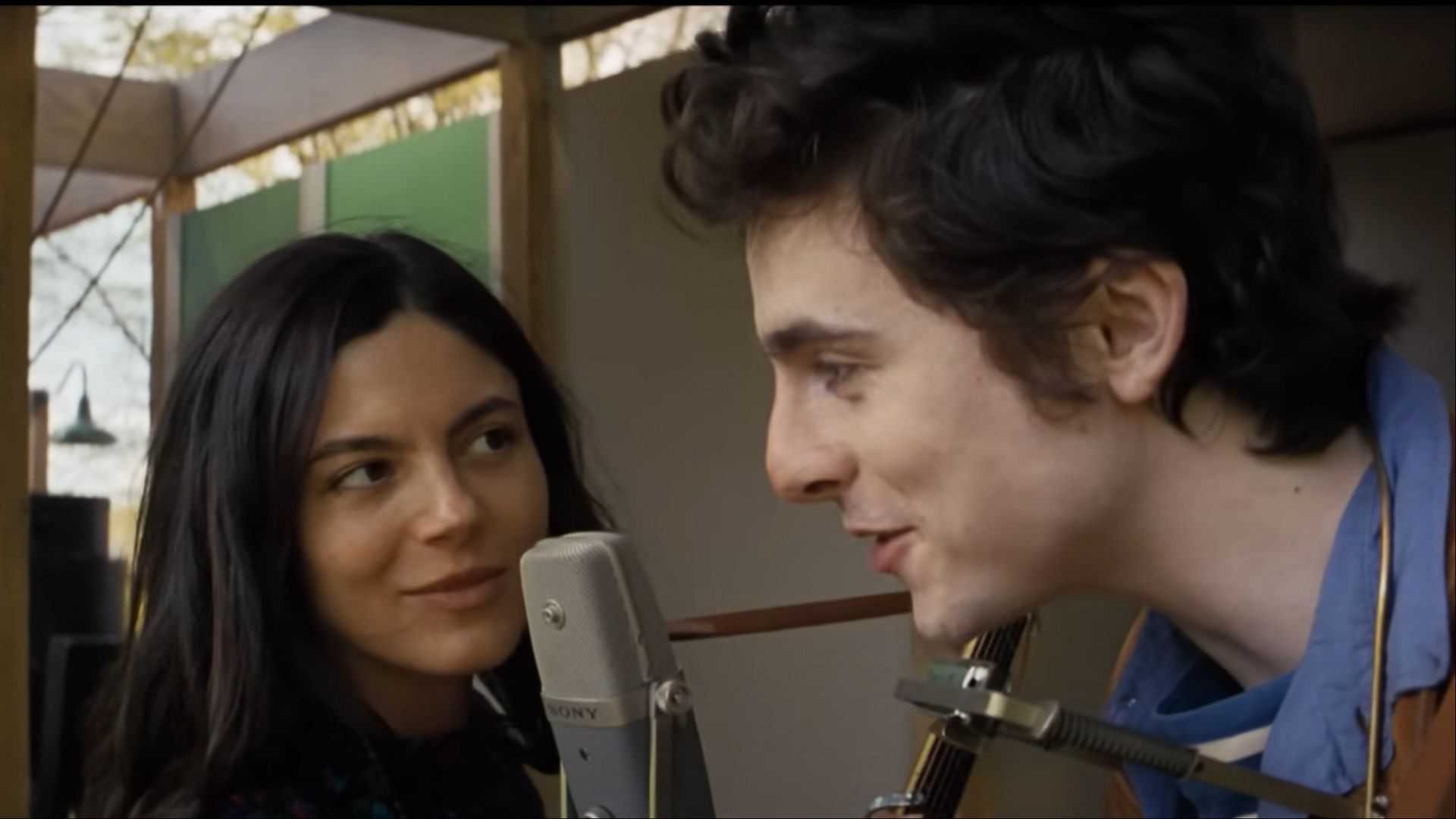 The biopic will also highlight his time with Joan Baez (Image via SearchlightPictures)