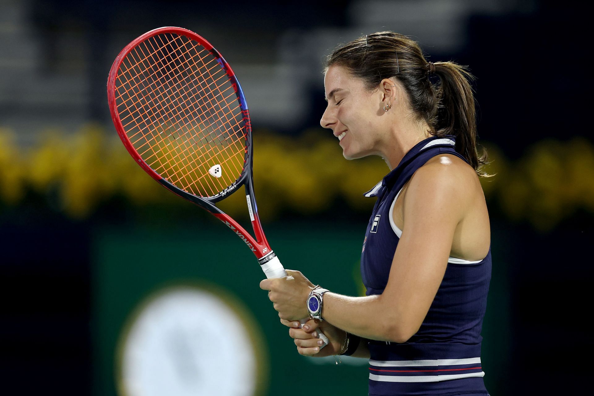 Emma Navarro reacts while playing against Sorana Cirstea in their third-round match during day four of the Dubai Duty-Free Tennis Championships - Source: Getty