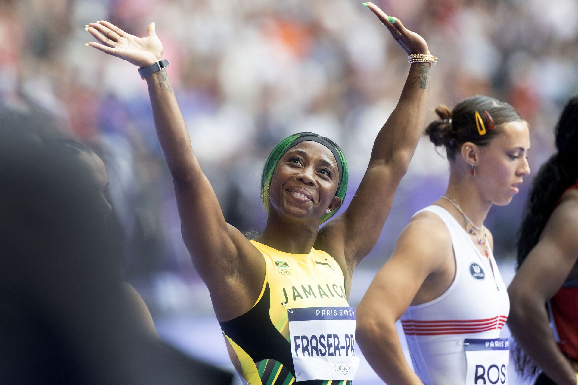 Shelly-Ann Fraser-Pryce waves to the crowd at the Olympic Games-Paris 2024 - Source: Getty