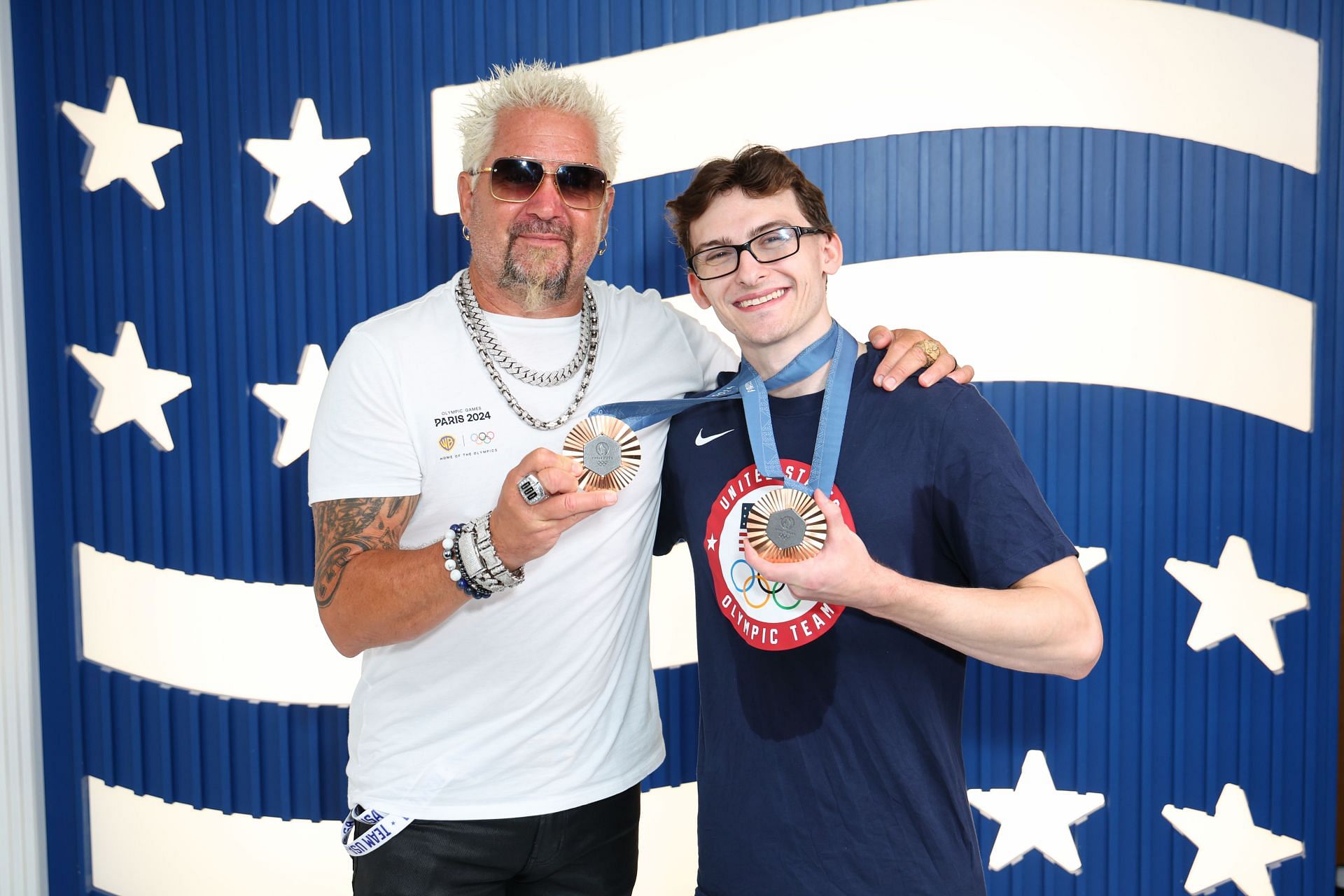 Nedoroscik with restauranter Guy Fieri at the USA House after the conclusion of the 2024 Paris Olympics (Image via: Getty Images)