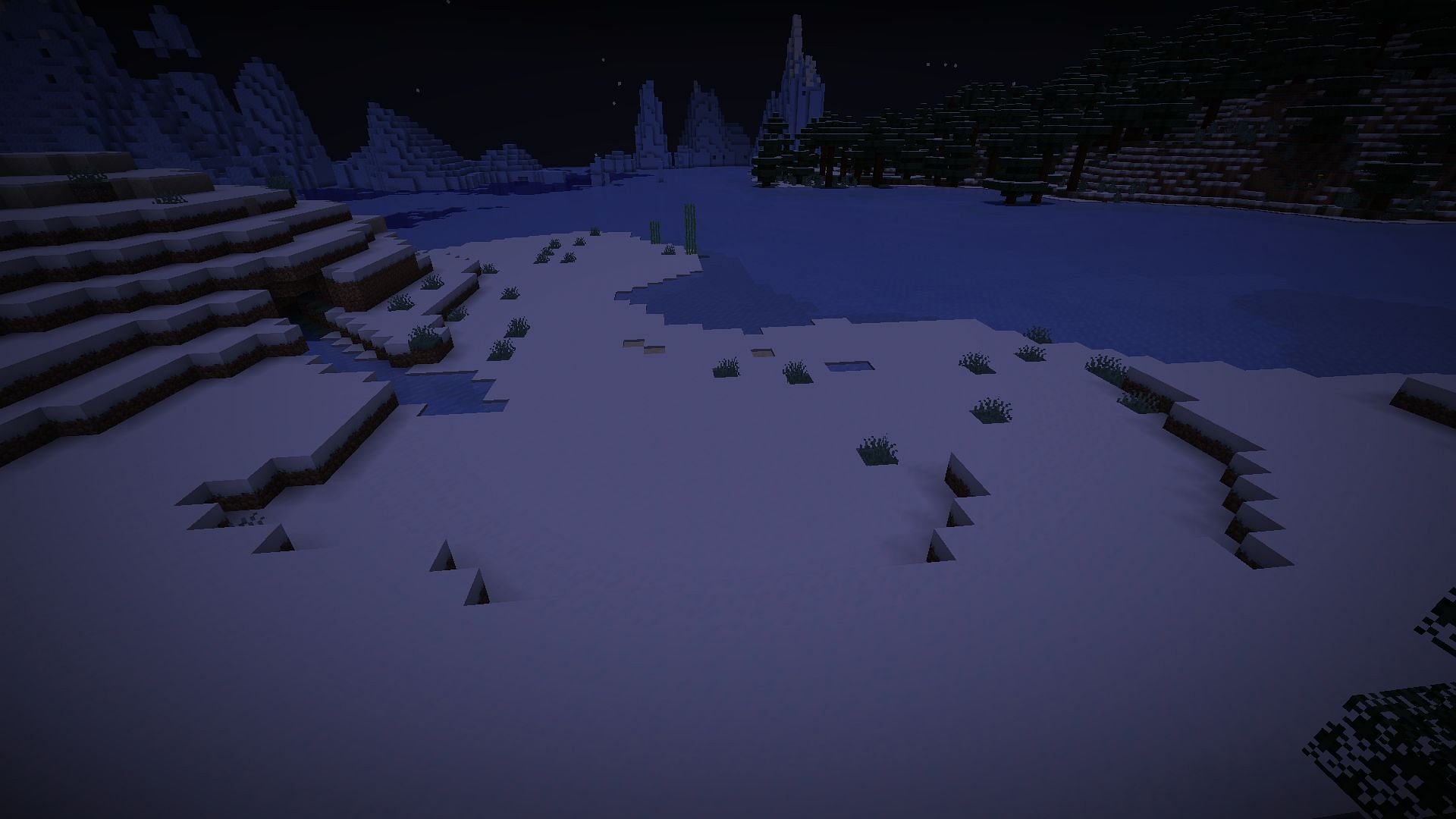 The snowy beach is a cozy place to build your base (Image via Mojang Studios)