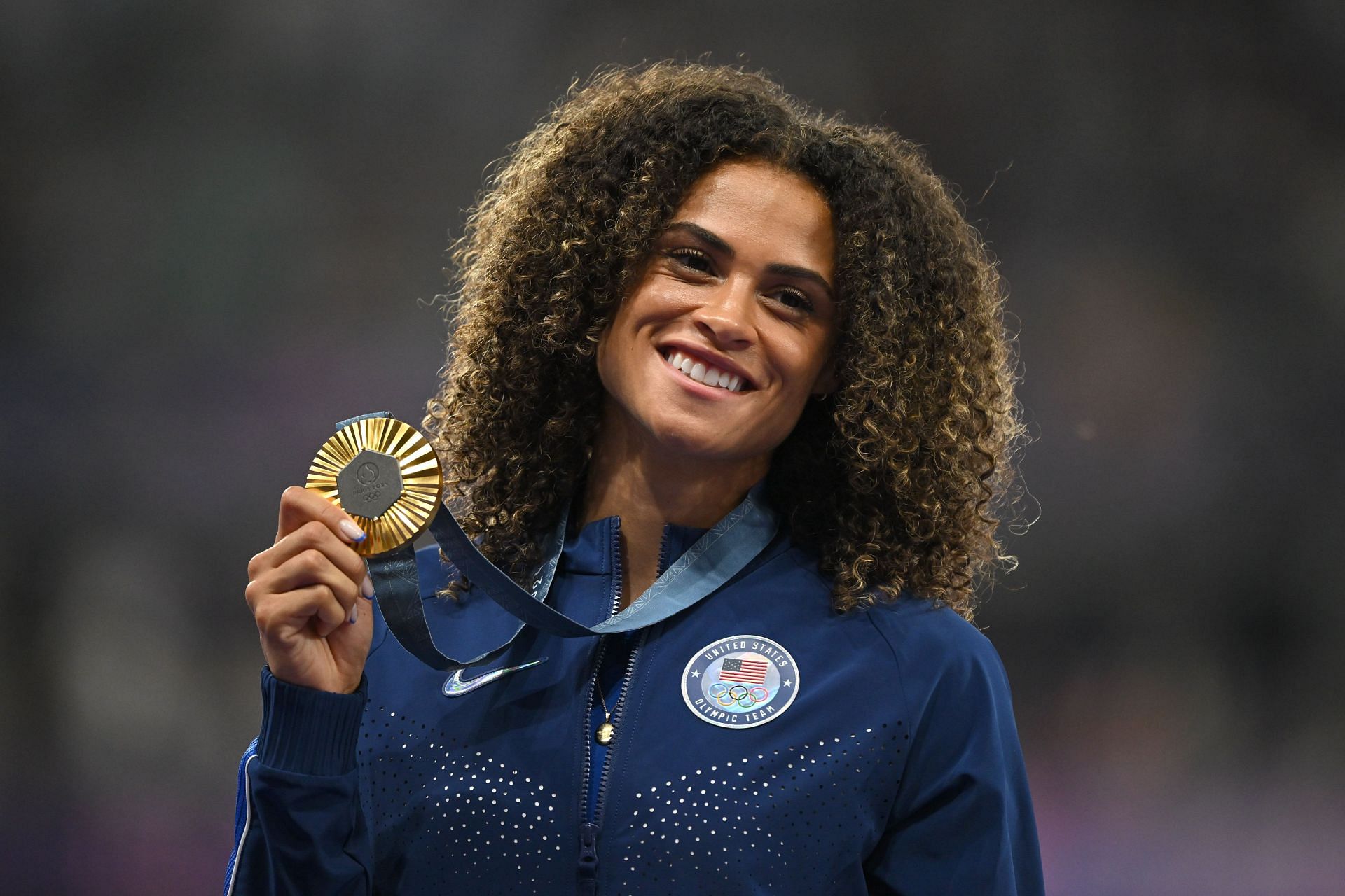 Sydney McLaughlin-Levrone poses with a gold medal at the 2024 Paris Olympics - Source: Getty