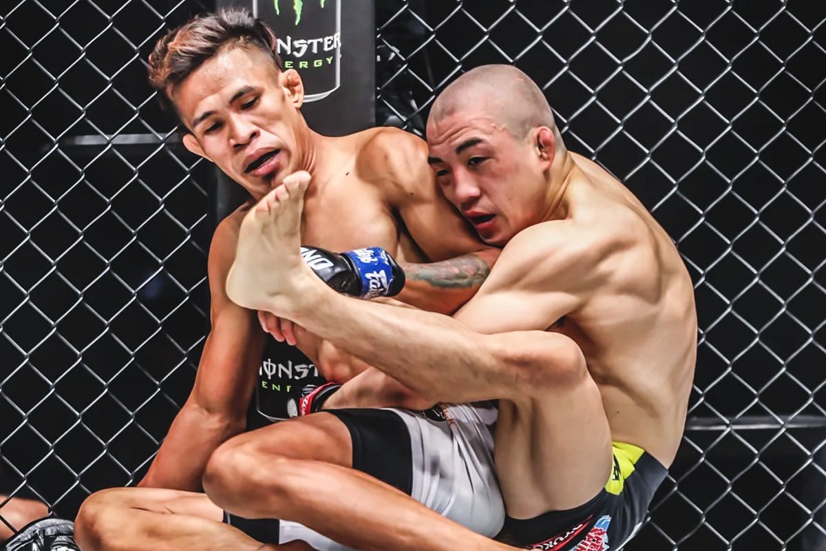 Keito Yamakita taking the back of Jeremy Miado. [Photo via: ONE Championship]